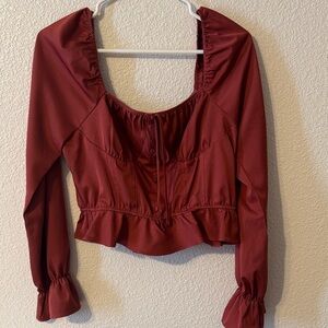 Chic Maroon Blouse with Ruffled Hem